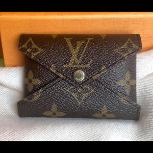 Monogram Kirigami Pochette Small